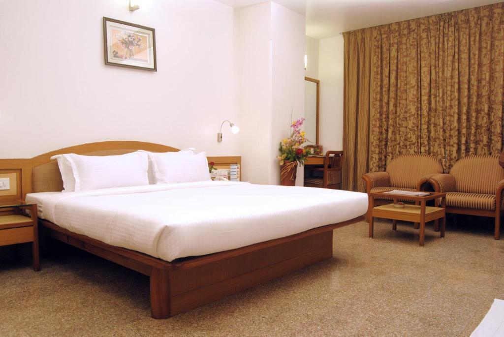 The Ambience Hotel Pune Værelse billede